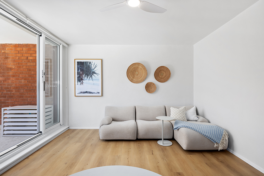 Kitchen renovation white cabinets timber floors Sydney